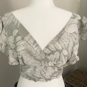 Final touch women’s crop top with tie back detail.